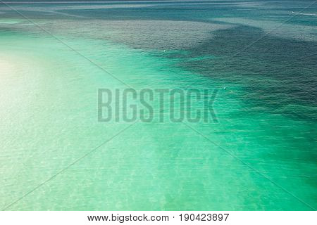 Beach tropical with white sandy and crystal water seen from above. Rawa island Malaysia .