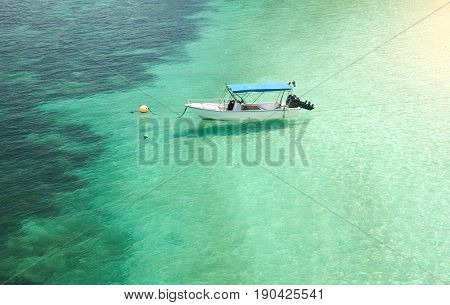 Boats on beautiful tropical beach in Rawa island. White sandy beach . Malaysia .