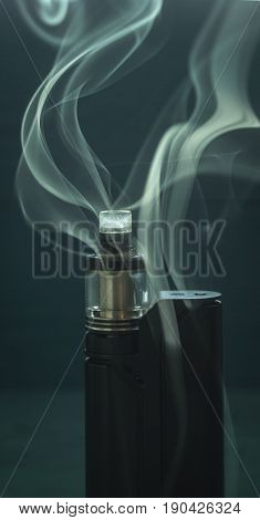 vaporizer on a blue background with smoke