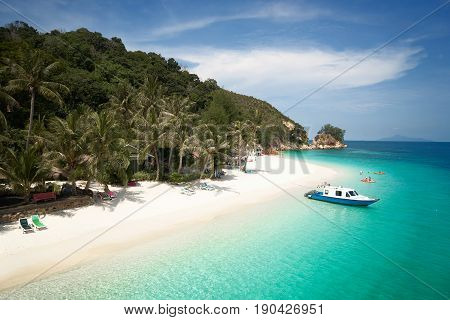 Beautiful beach aerial view over a Rawa island. White sandy beach seen from above. Malaysia .
