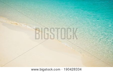 Beach tropical with white sandy and crystal water seen from above. Rawa island Malaysia .