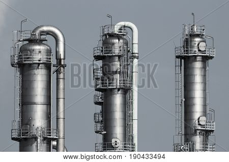 Cooling towers at an oil and gas refinery industrial plant.