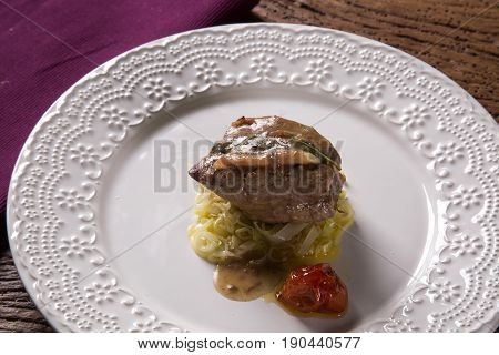 Saltimbocca Veals In Rich Neapolitan Sauce And Tagliatelle Pasta