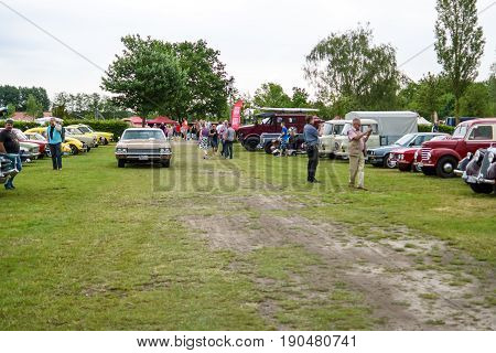 PAAREN IM GLIEN GERMANY - JUNE 03 2017: Various retro cars stand on the field. Exhibition "Die Oldtimer Show".