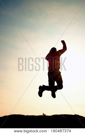 Flying Man. Young Man Falling Down On Sky Background.