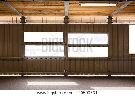 Corrigated Metal Wall Construction Site Small Windows Blank Signs Four Elements