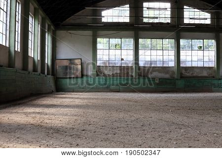 Beautiful natural lights in empty riding arena is suitable for dressage horses without people