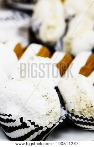 Tasty White Macaroons On Table