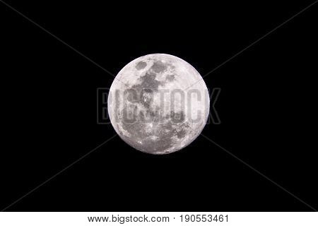 close up of full moon in night sky