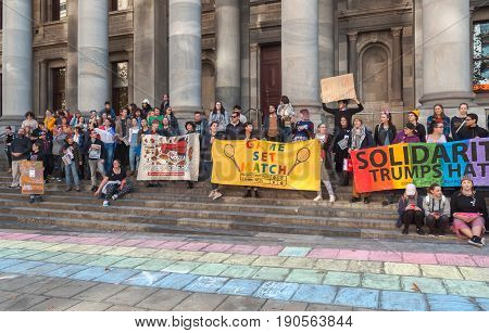 Adelaide, AU - June 10, 2017: South Australians gather at Parliament House and Rundle Mall to protest Trump's assumed support for laws discriminating against LGBTI people in the name of religious freedom.