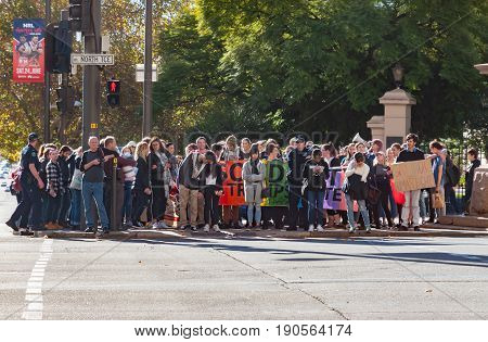 Adelaide, AU - June 10, 2017: South Australians gather at Parliament House and Rundle Mall to protest Trump's assumed support for laws discriminating against LGBTI people in the name of religious freedom.