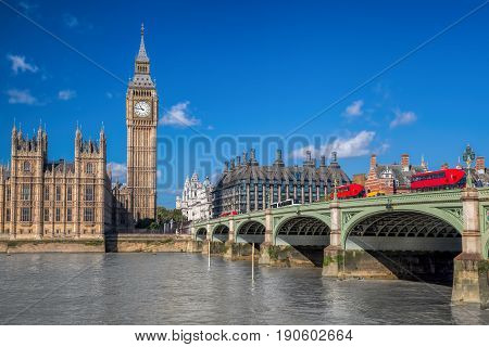 London With Red Buses Against Big Ben In England, Uk
