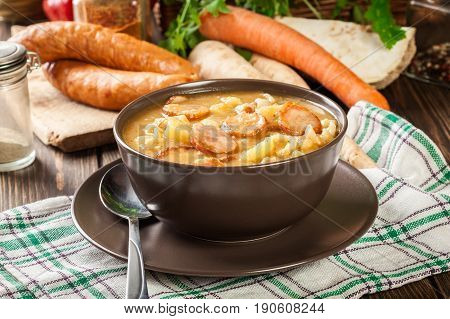 Traditional Polish Split Pea Soup With Sausage, Bacon And Potatoes
