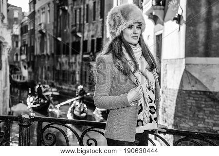 Tourist Woman In Venice, Italy In Winter Looking Into Distance