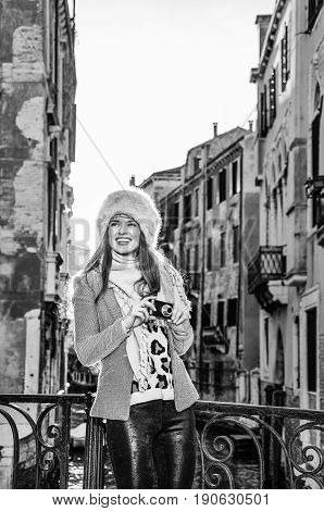 Traveller Woman In Venice Taking Photo With Digital Camera