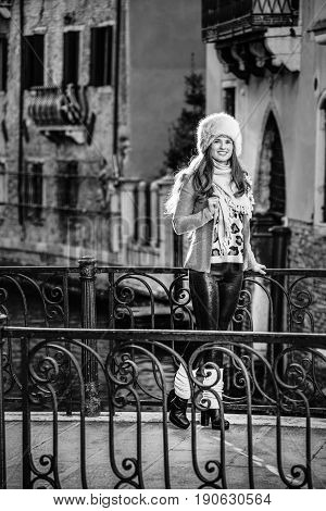 Tourist Woman In Venice, Italy In Winter Looking Into Distance