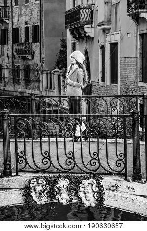 Traveller Woman In Venice, Italy In Winter Enjoying Promenade