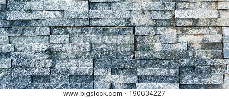 Dark grey stone tile texture brick wall surfaced