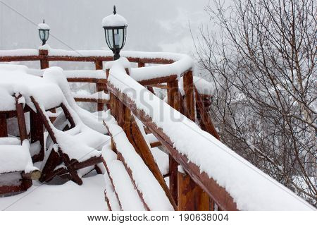 Winter ski chalet and cabin in snow mountain