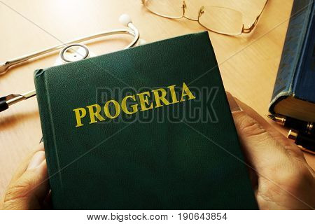Book with title Progeria on a table.