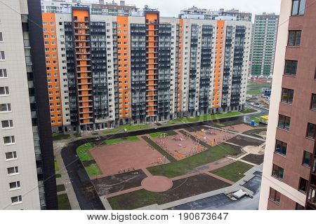 St Petersburg Russia -- July 28 2016: Colorful сhildren's playground for kids in new apartment district for play