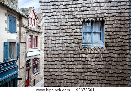 Architechtural fragment of the ancient buildings of the old town on the famous Mont Saint Michel island in France