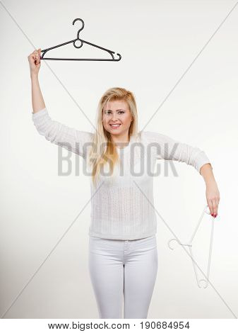 Woman Holding Clothes Hanger
