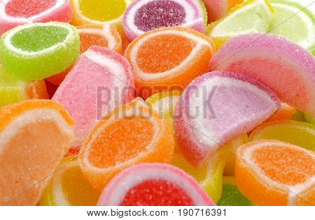 Multi colored fruit candy jelly group background
