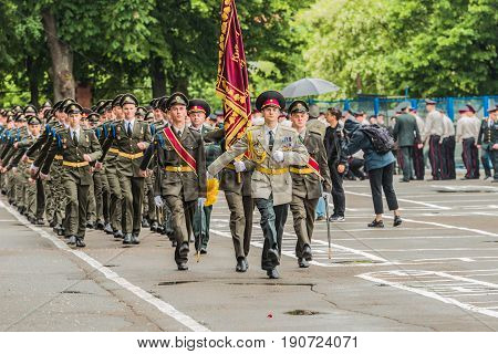 KYIV, UKRAINE - May 26, 2017: Students of the Kiev military lyceum of Ivan Bohun take part in the celebrations dedicated to the end of the academic year. Removal of the lyceum's banner.