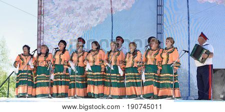 RazdorskayaRostov Region Russia- June 04; 2017: Group of older people singing at Trinity