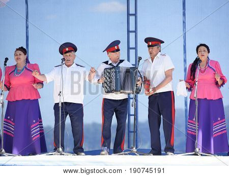 RazdorskayaRostov Region Russia- June 04; 2017: Group of elderly Cossacks singing at the Trinity