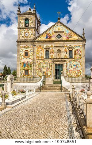 View at the painted decoration facade church Our Lady of Amparo in Valega - Portugal