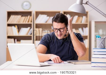 Young freelance worked working on computer