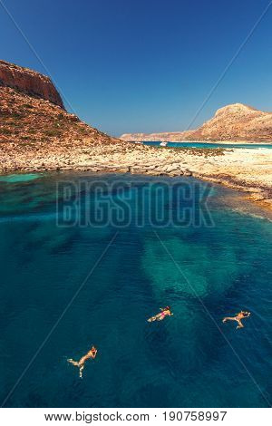 swimming in the nearby lagoon Balos in the northwest of the island of Crete Greece
