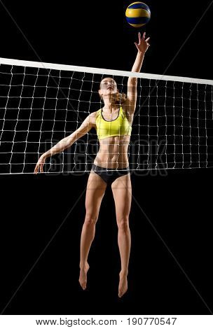 Young woman voleyball player isolated (with ball and net ver)