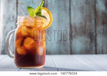 Cold brew coffee or black tea in a mason jar