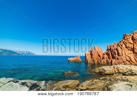 Rocce Rosse beach on a sunny day. Sardinia Italy