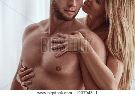 Woman Embracing Her Athletic Partner
