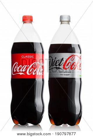 London, Uk - June 9, 2017: Bottles Of Coca Cola Soft Drink On White.the Coca-cola Company, An Americ