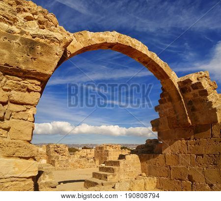 Ancient ruins of Kourion city near Pathos and Limassol, Cyprus. Santa Colones Castle ruins with blue sky. Travel outdoor background