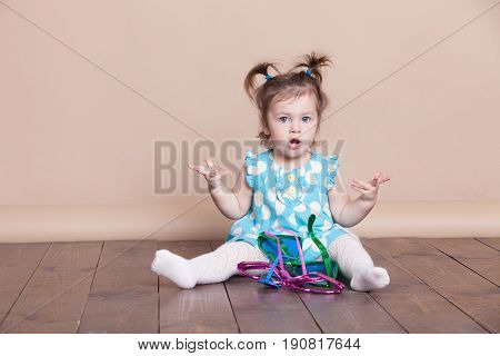 Little Girl Plays With Big Glasses, She Is Funny