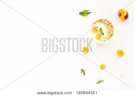 Fresh Summer Fruit. Healthy Breakfast With Peach, Nectarine, Apricot, Muesli, Peach Yogurt, Mint, Ce