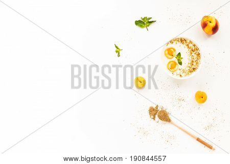 Fresh Summer Fruit. Healthy Breakfast With Peach, Nectarine, Apricot, Muesli, Peach Yogurt, Mint, Ce