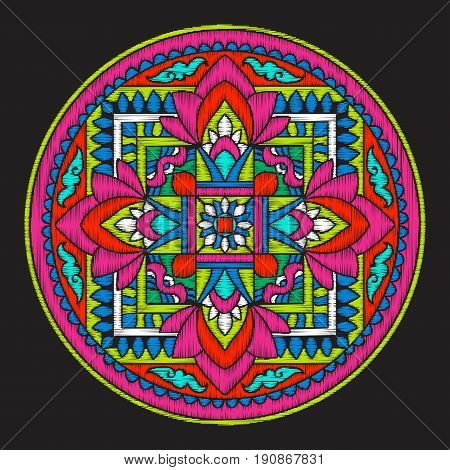 Embroidery with tibet mandala on black background. Stock vector illustration.