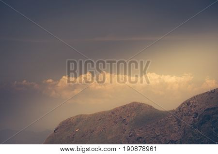 Mountain grass and blue skytop of green hill