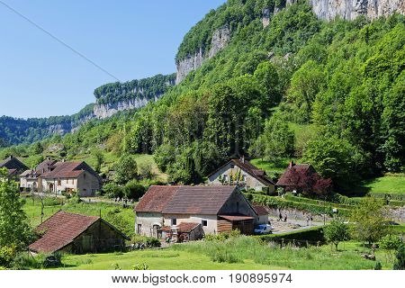 The village of Baume-les-Messieurs lies within the most extensive of the steephead valleys of the Jura escarpment the 