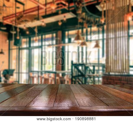 Table wood copy space background in coffee shop