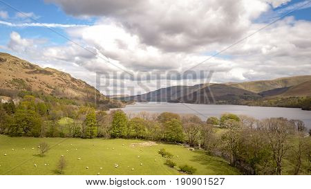 Ullswater, English Lake District. Aerial drone image of the landscape surrounding Ullswater in the English Lake District on a bright spring day.