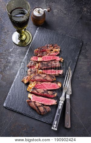 Barbecue Wagyu Tagliata di Manzo Entrecote as close-up on a slate