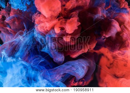 Abstract background smoke texture in the air. Smoke fragments isolated on dark background.